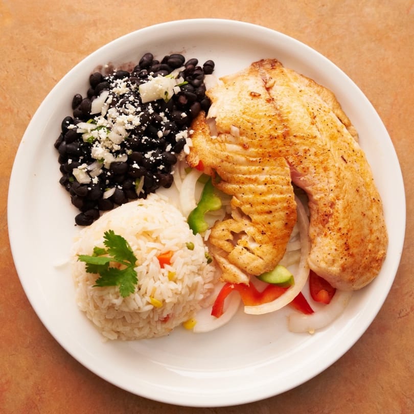 Acapulcos Mexican Family Restaurant & Cantina's grilled fish fillet with black beans and rice.